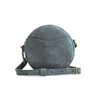 Storm*Small | Circle shaped crossbody bag with top zipper