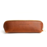 All Color: Honey | Leather pouch with curved seams and top zipper