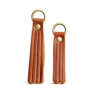 All Color: Honey | slim leather tassel with brass ring