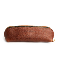 All Color: Nutmeg | Leather pouch with curved seams and top zipper