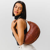 Nutmeg Classic | Crescent shaped shoulder bag with zipper closure and adjustable strap